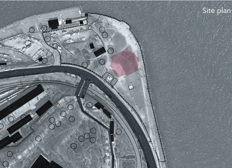Site plan drawing showing a triangular waterfront plot with curved roadways and one structure highlighted in pink