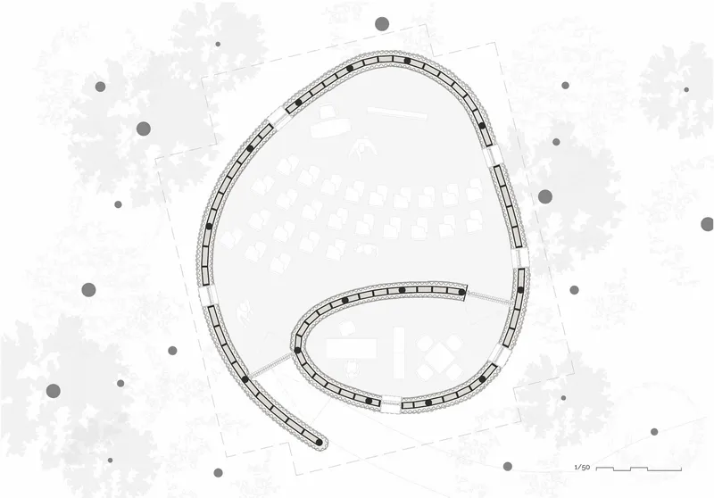 Floor plan drawing showing a petal-shaped volume with curving walls and internal column grid