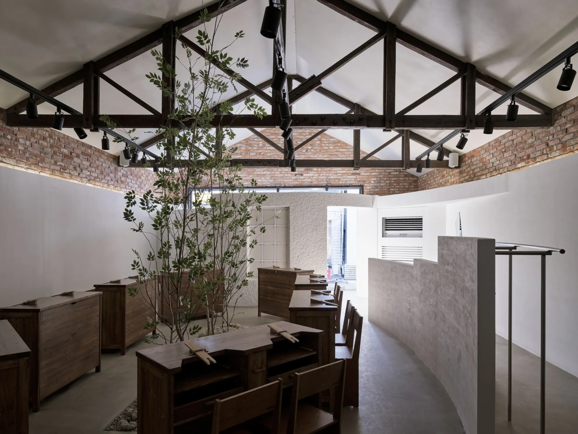 design by 83 Converts a Busan Warehouse into a Ring Workshop That Sells Experiences, Not Products