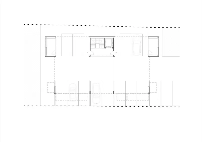 Floor plan drawing showing a central stair core flanked by symmetrical balconies and interior partitions