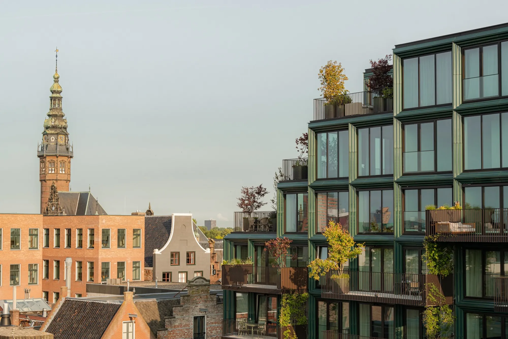 De Zwarte Hond and Loer Architecten Replace a Groningen Warehouse with a Green-Glazed Urban Catalyst