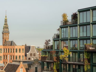 De Zwarte Hond and Loer Architecten Replace a Groningen Warehouse with a Green-Glazed Urban Catalyst