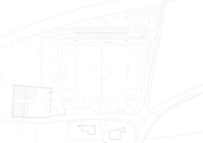 Site plan drawing showing a football pitch with flanking buildings on an irregular plot