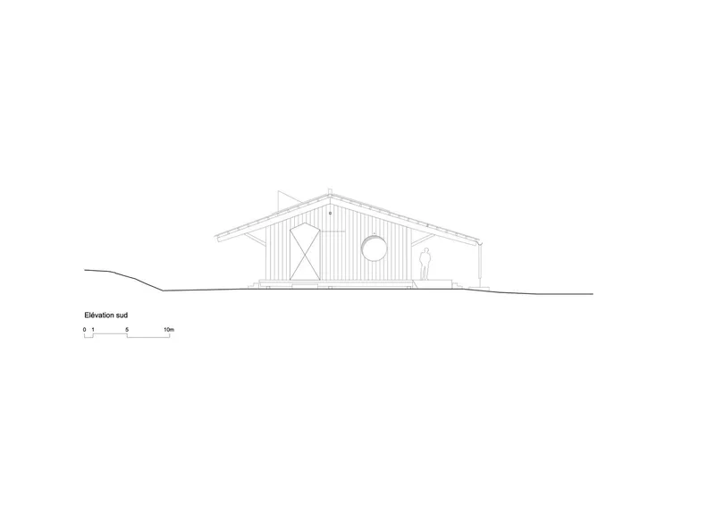 Elevation drawing showing a single-story gabled structure with vertical siding and circular window openings