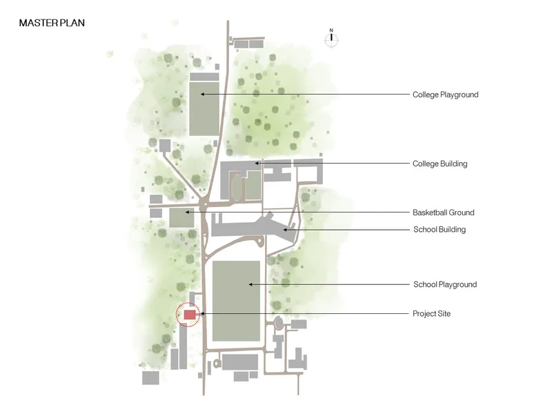 Master plan drawing showing the project site within a campus layout with playgrounds and scattered trees
