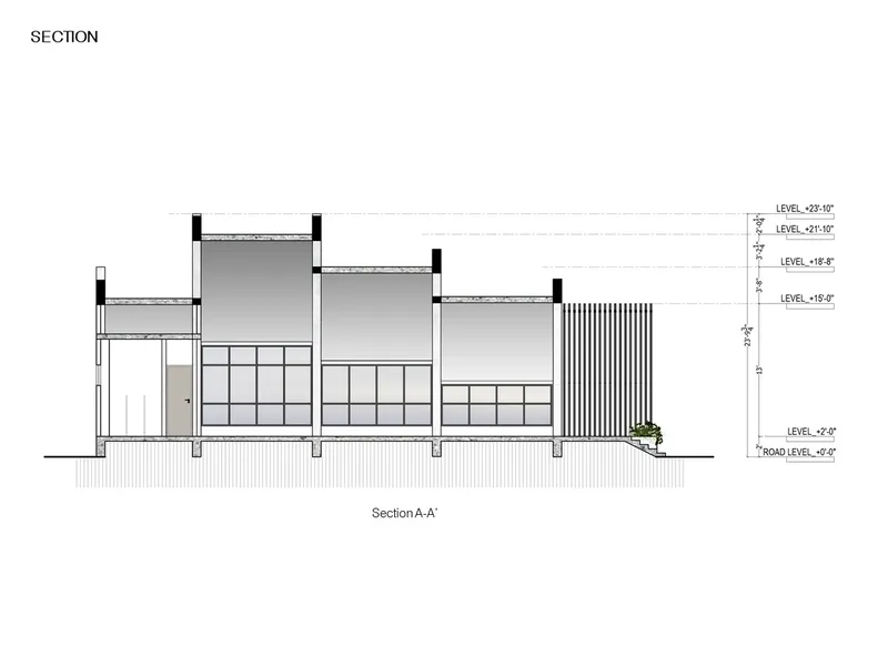 Section drawing through the waiting areas revealing stepped roof heights and the vertical louvered wall element