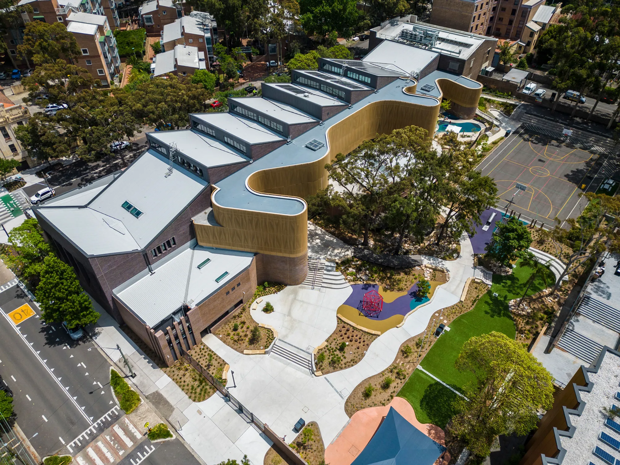 fjcstudio Wraps a Sydney Public School in Casuarina Screens and Indigenous Memory