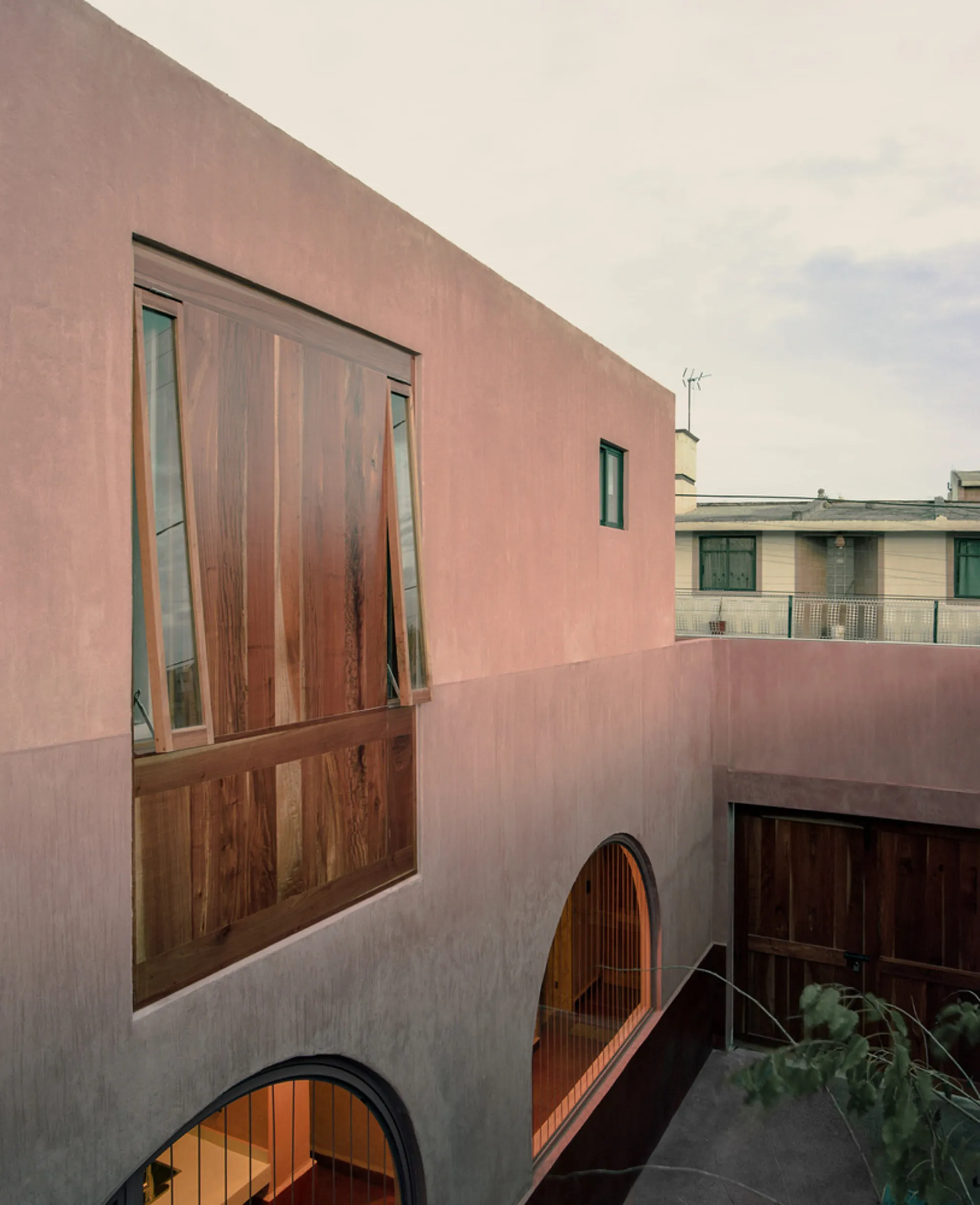 o.d.e. Builds a Pink Stone Retirement Home Around Two Courtyards in Hidalgo, Mexico