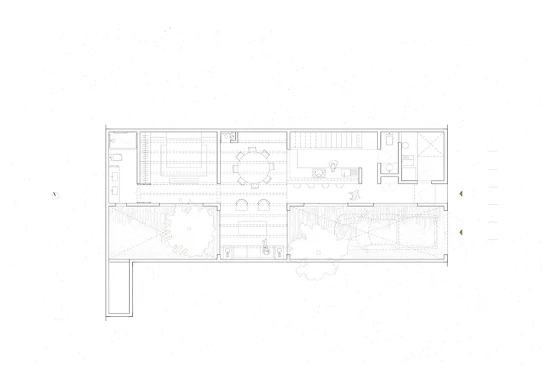 Floor plan drawing showing ground level with central living spaces flanked by planted courtyards