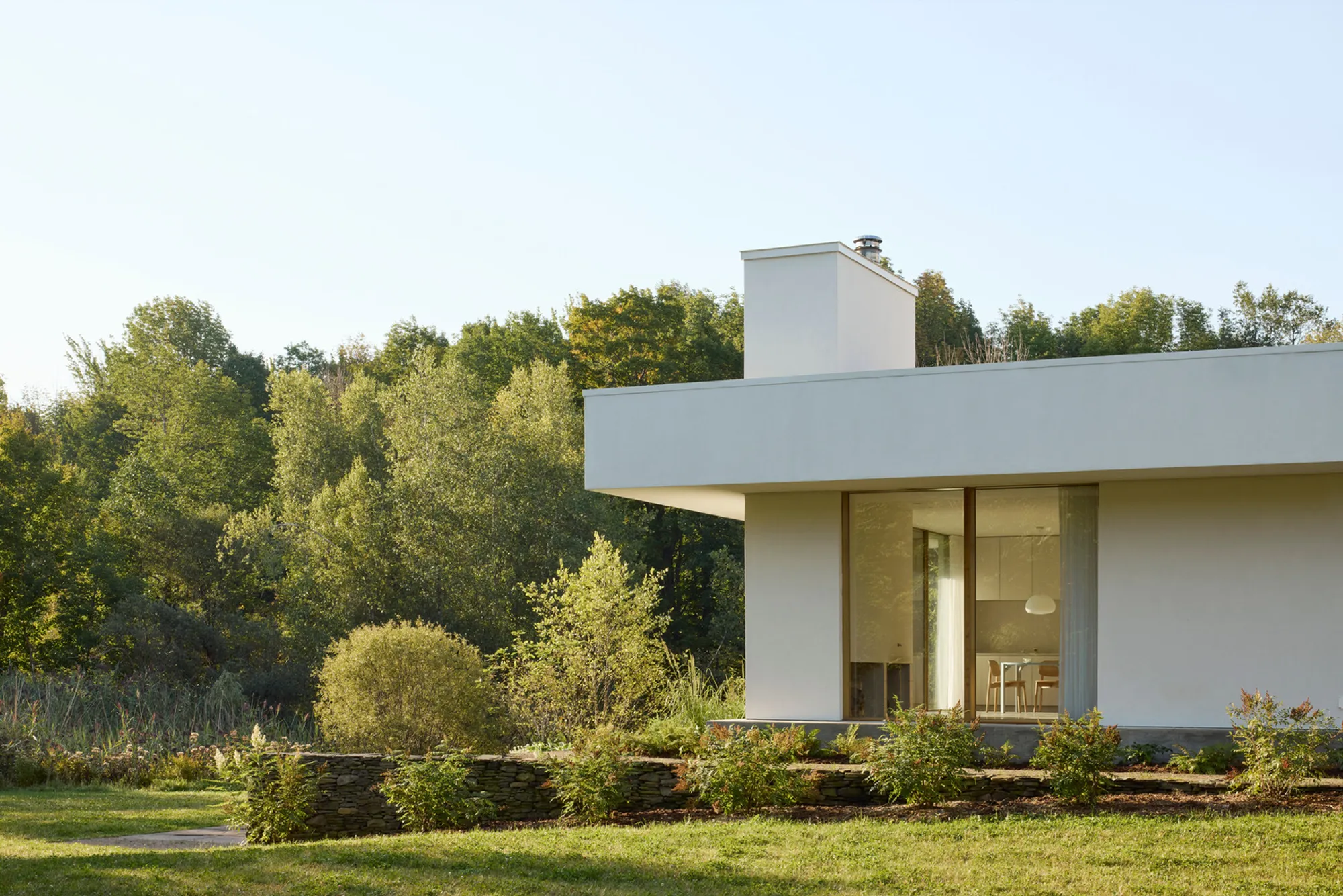 Pelletier de Fontenay Wraps a 1908 Quebec Stone House in Hemp and White Mineral Plaster