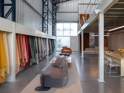 Innovative Showroom Design: Transforming Spaces with Fabric and Light