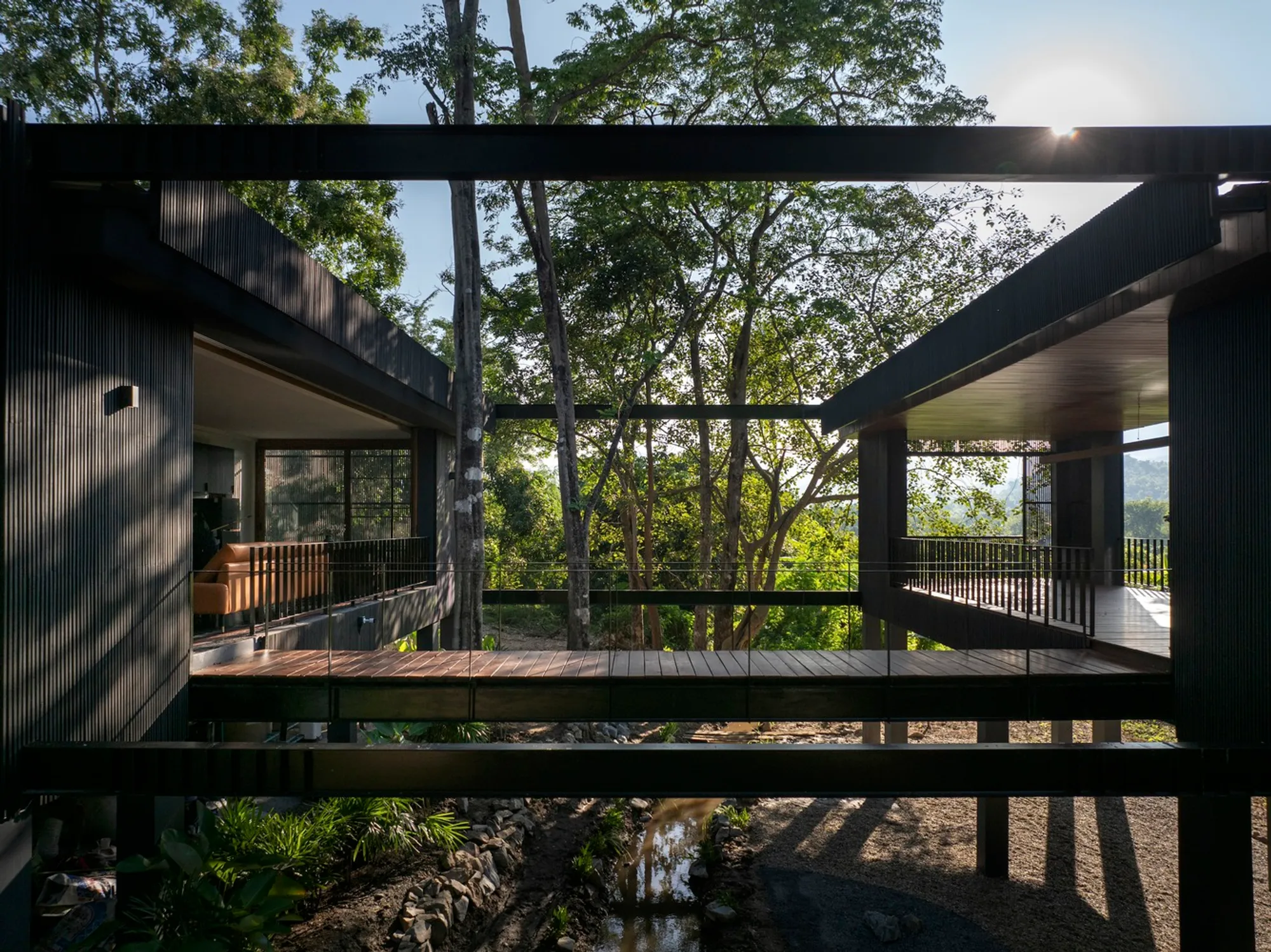 Sustainable Forest Home Design: Jomthong Raintree House by Sher Maker