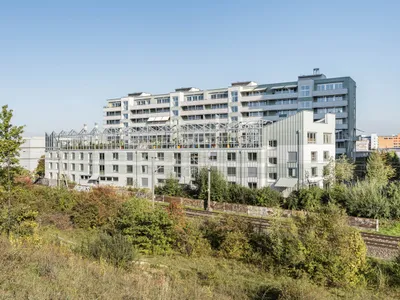 Eco-Friendly Urban Housing: A Deep Dive into Hochbord Housing by Conen Sigl Architekten