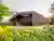 Sustainable Family Home Design: A Deep Dive into Frame House by OFIS Architects