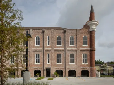 Transforming History: Adaptive Reuse Architecture at The Schoolhouse / Rome Office