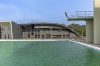 M:OFA Studios Wraps a Wave-Shaped Gridshell Around India's Largest Water Sports Institute in Goa