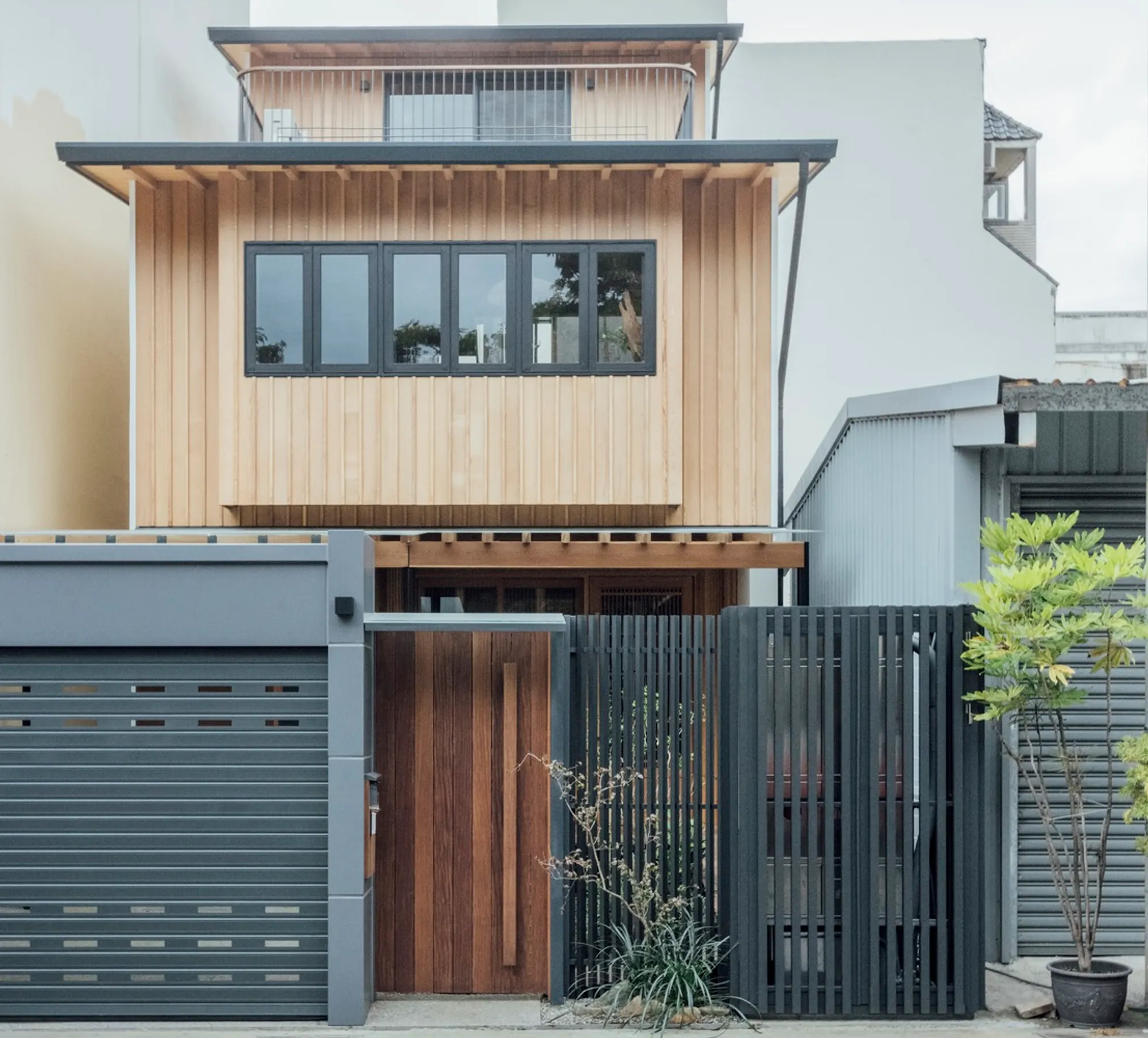 Eco-Friendly Architecture Design: The House in Between Small and Large by Nameless Tree Design