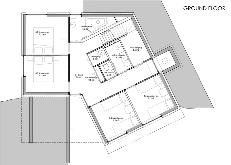 Ground floor plan drawing showing angled volumes with bedrooms, stair and terrace embedded in sloped site