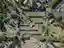 This aerial photograph showcases a meticulously designed cemetery featuring a formal garden layout. 