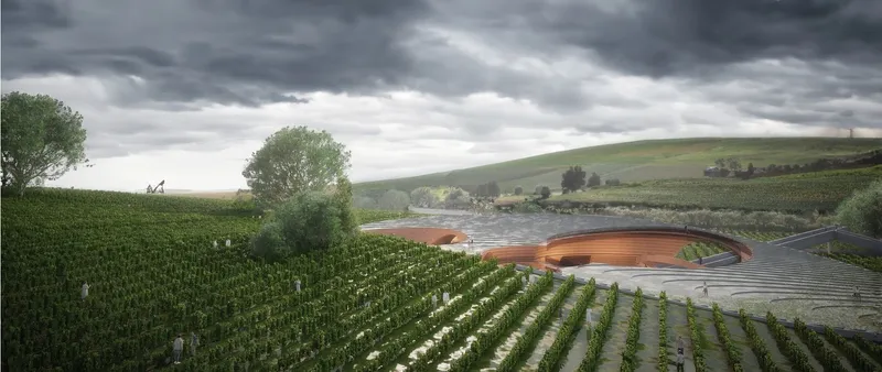 Vineyard seamlessly blending with innovative winery architecture.