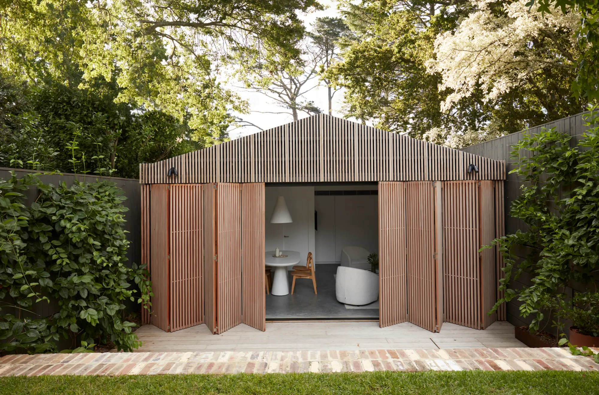 Modern Pool House Design in Australia by buck&simple