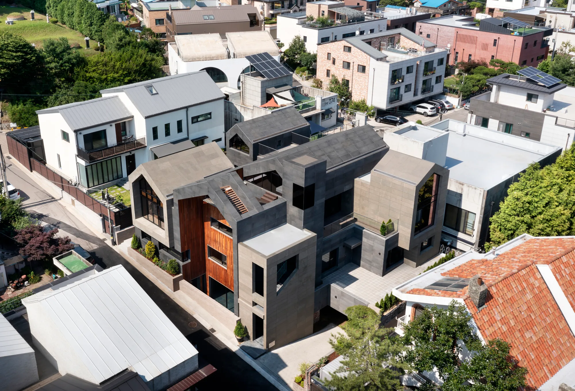 GREE Multi-Family Housing by Suum21 Architecture: A Contemporary Village for Urban Living