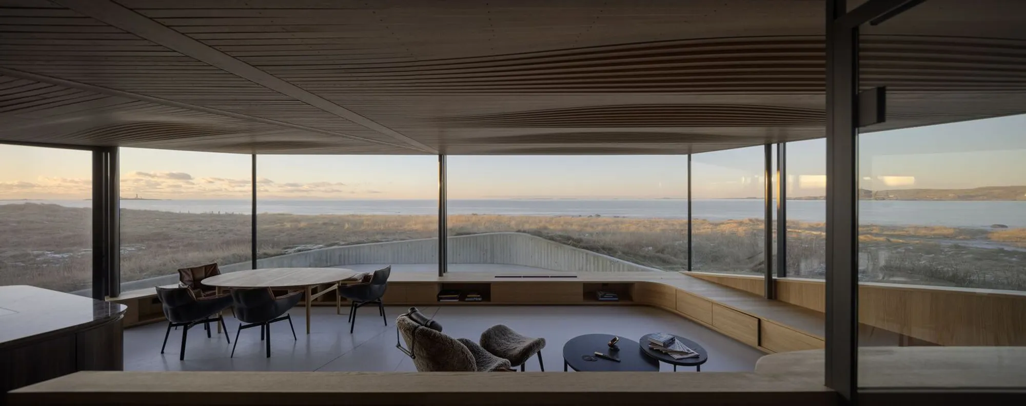 Hellestø Cabin: A Modern Coastal Cabin Design Merging Architecture with Norwegian Dunes