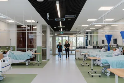 This image showcases the interior of a modern hospital ward, designed with a focus on functionality 