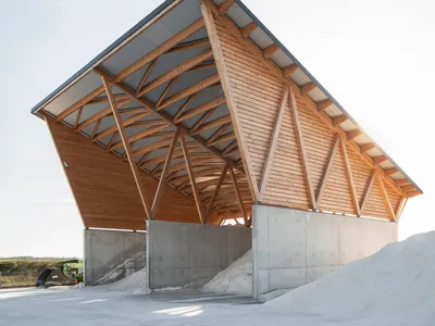 Salt Storage Sheds by SAPIENS ARCHITECTES: Functional Infrastructure Elevated through Poetic Simplicity