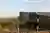Bowentown Bach House by Edwards White Architects: A Charred Driftwood-Inspired Retreat Along New Zealand’s Rugged Coastline