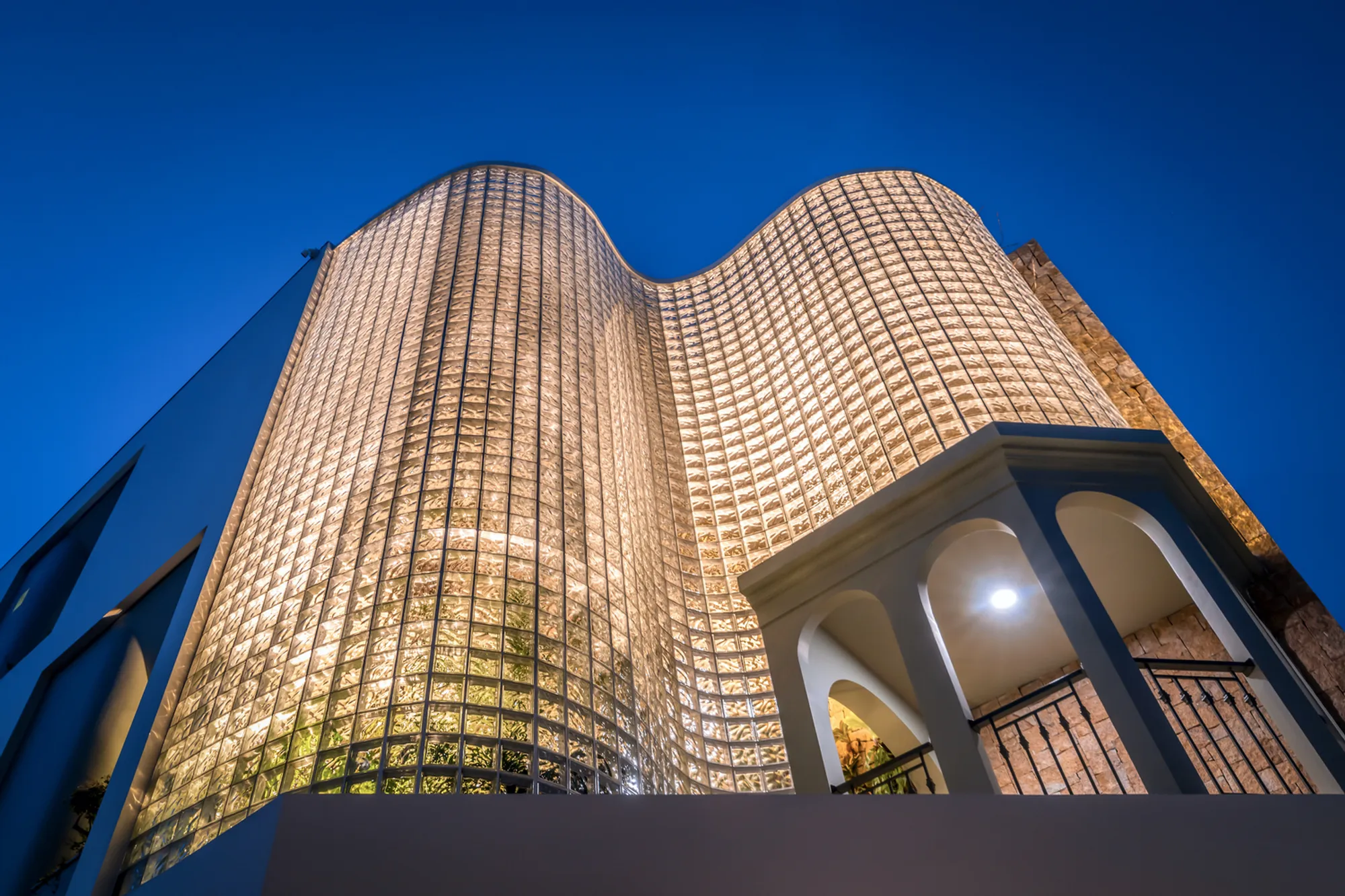 Crystal Pavilion House: A Luminous Glass Brick House by DA VÀNG Studio