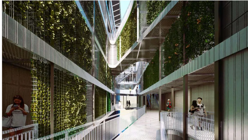 Interior courtyard with vertical hydroponic growing systems flanking a central walkway and figures passing through