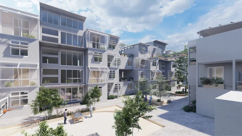 Pedestrian courtyard with planted trees and residents walking between the mixed-height residential blocks