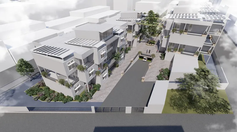 Aerial view of a residential courtyard model showing terraced housing units with trees and central paving