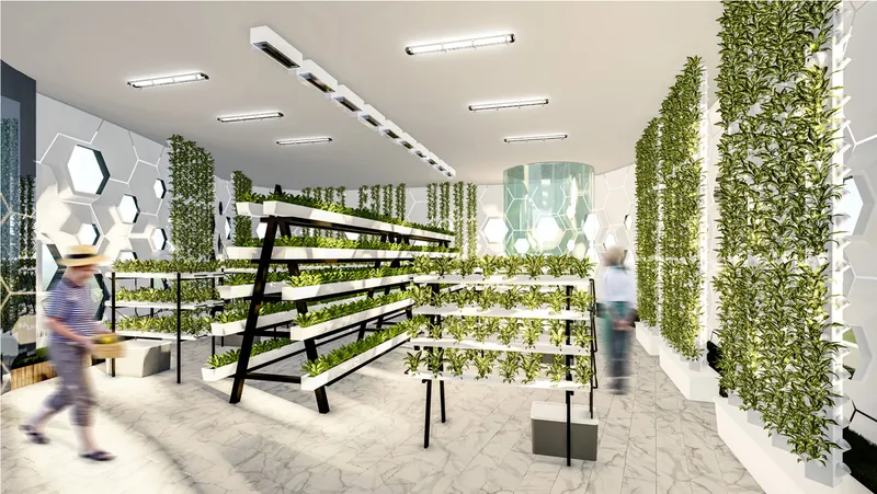 Interior hydroponic farming space with tiered grow beds, vertical plant towers, and people in motion