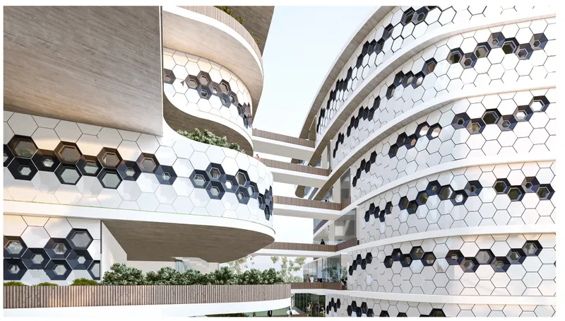 Hexagonal white and black facade tiles wrapping curved volumes with bridging connections between masses