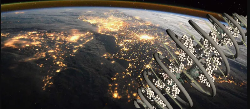 Orbital view showing the spiral modules extending from the illuminated nighttime Earth with city lights visible below
