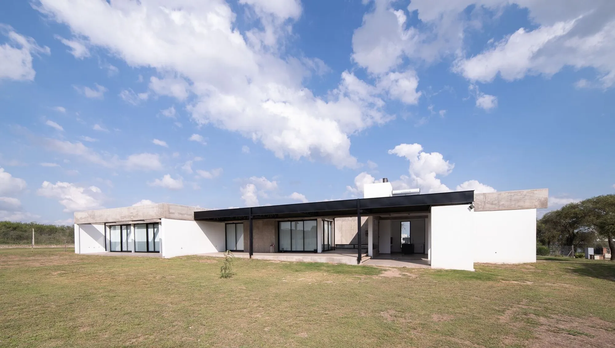 Causana House by ODA - Oficina de Arquitectos Lanzone - Gabarro: A Harmonious Dialogue Between Concrete, Landscape, and Light