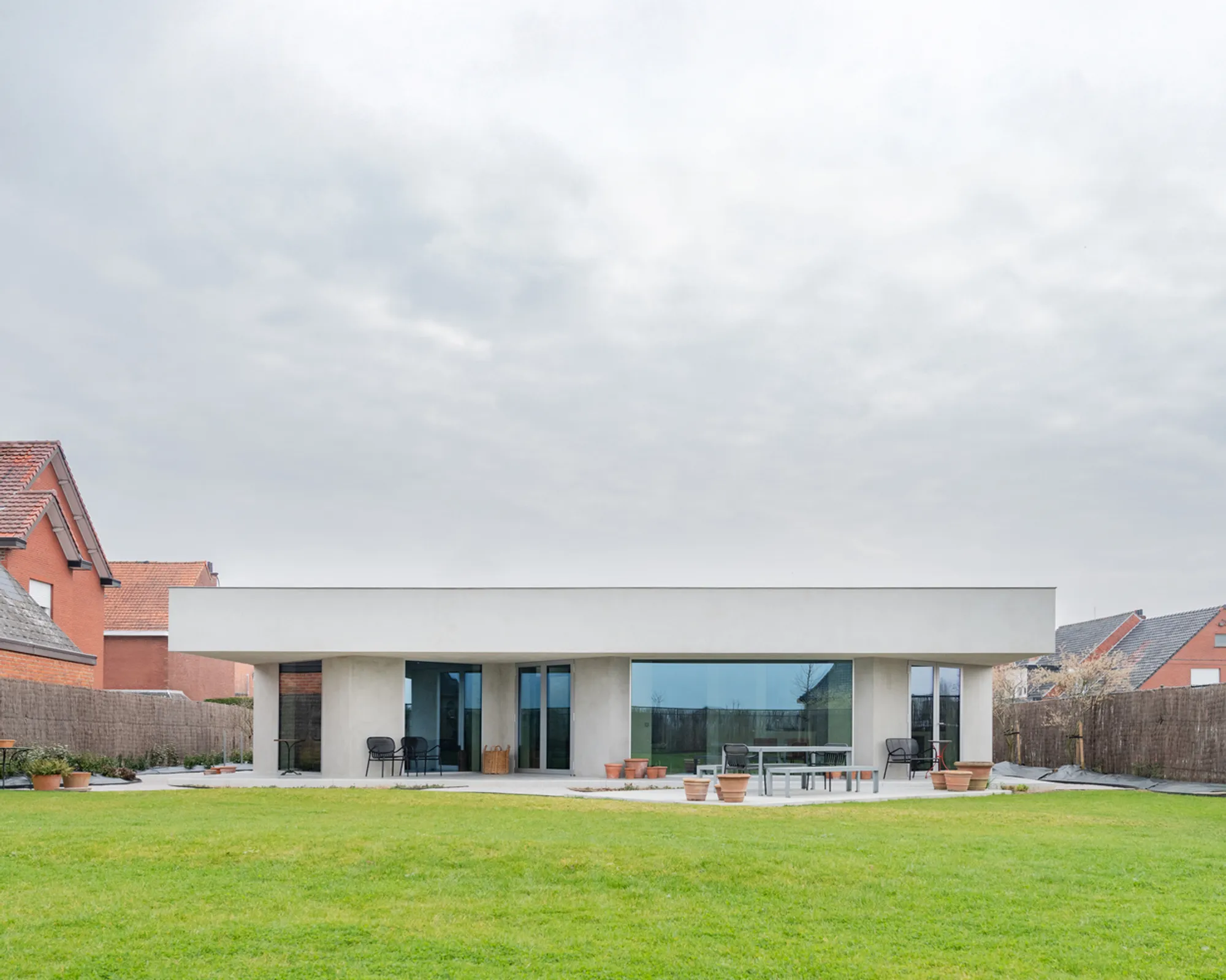 45° Grid House: A Contemporary Concrete House Design by Objekt Architecten