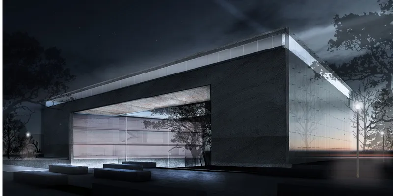 Night view of the glazed facade framing an interior tree beneath a floating concrete canopy