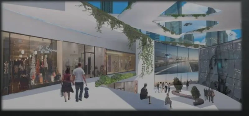 Interior view of a multi-level retail concourse with overhead greenery and pedestrians moving through the space