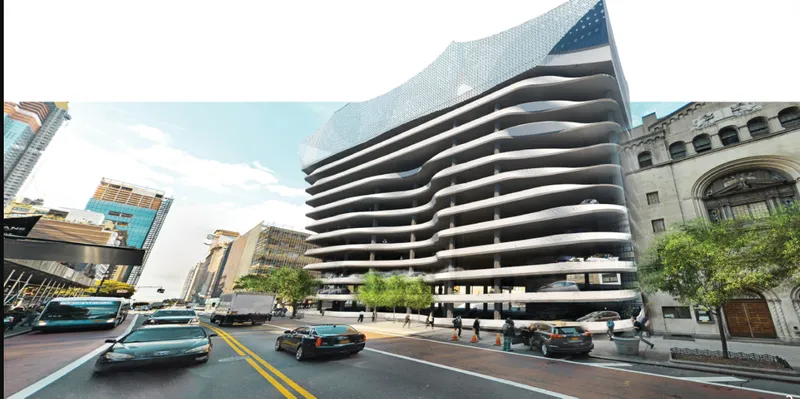 Street level view of the ribbed facade with curved balconies and sloped roofline under blue sky
