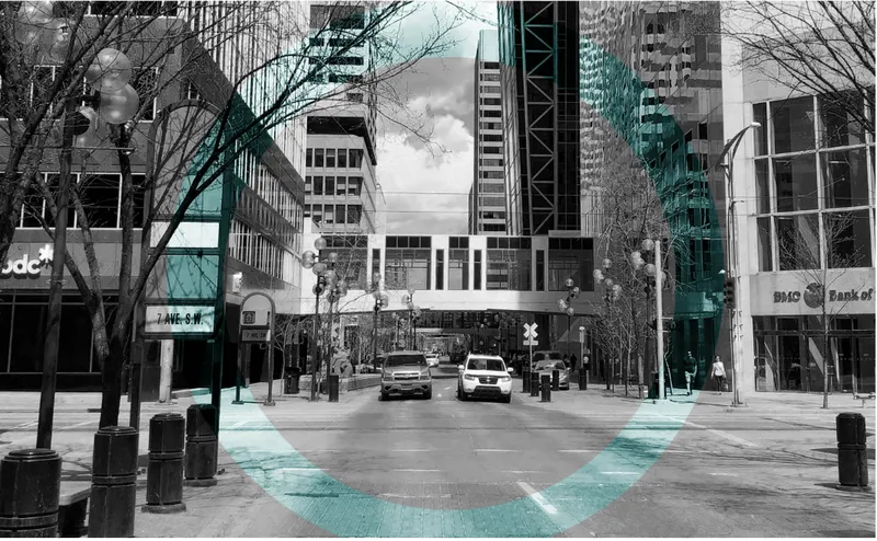 Street view down urban corridor with bare winter trees and colored overlay pattern across the pavement