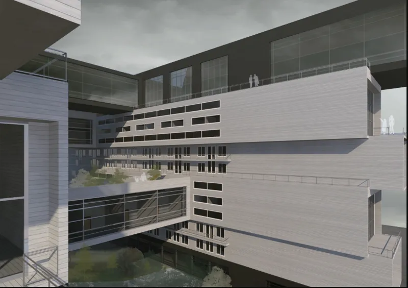 Interior courtyard view framed by glass facades and horizontal banded cladding with connecting bridges overhead