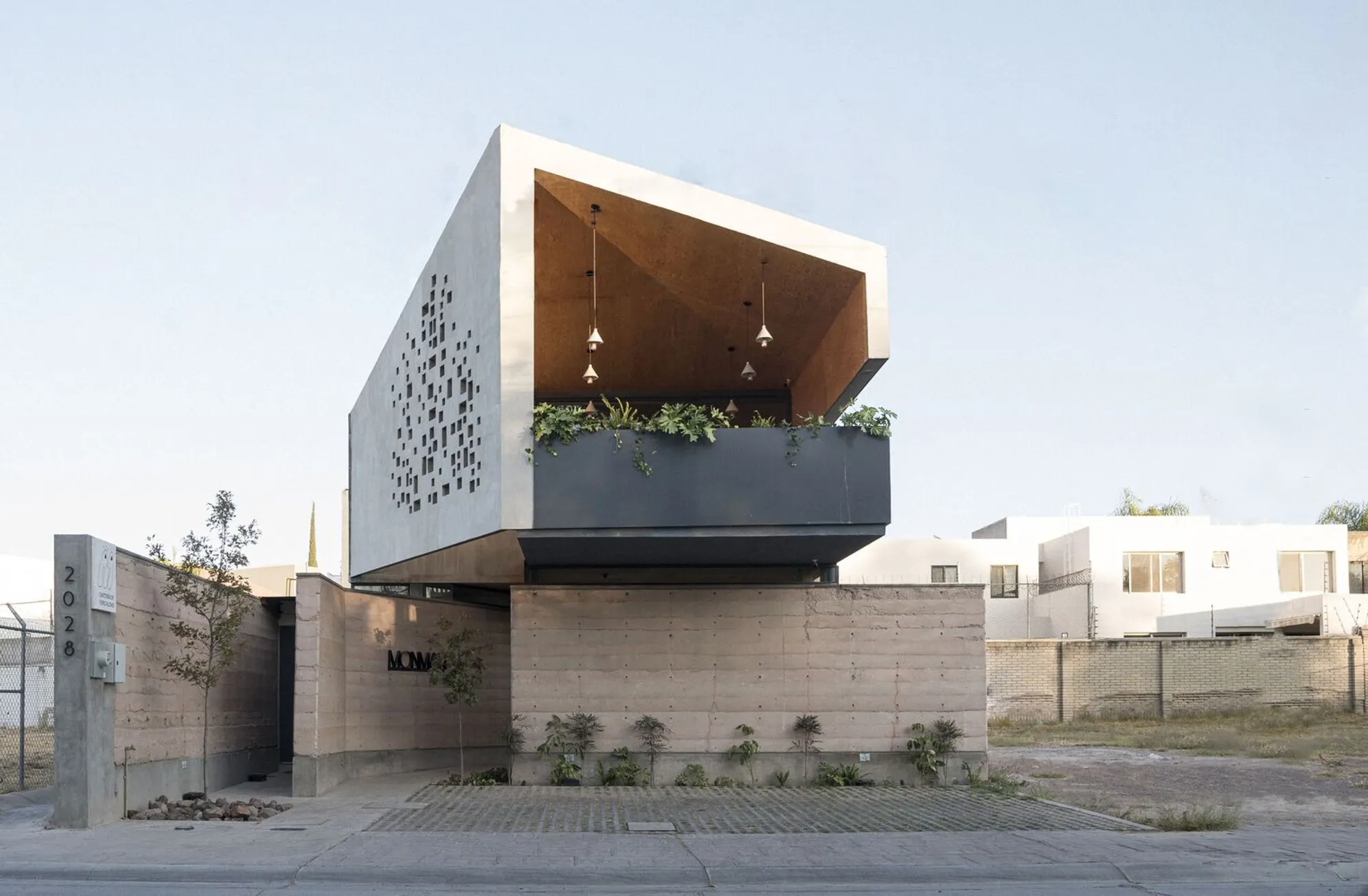 Monman Café by LM Arkylab: A Sensory Café Oasis Rooted in Earth and Nature