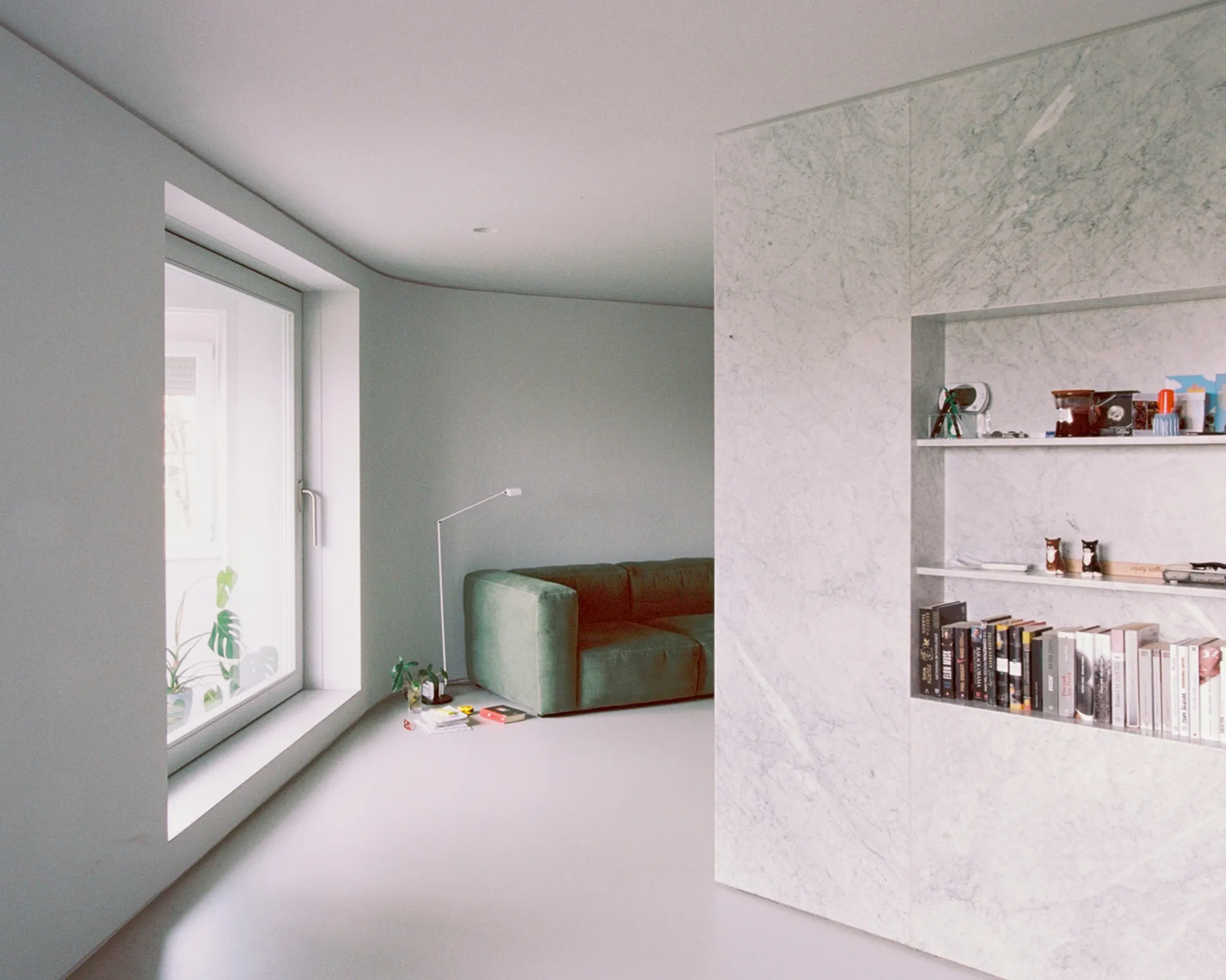 Apartment Barjanska by Arhitekti Počivašek Petranovič: A Modern Apartment Renovation Rooted in Material Simplicity