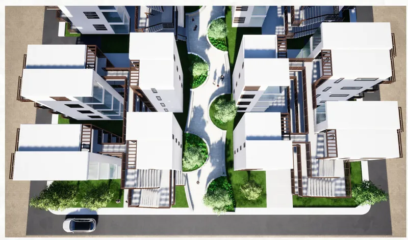 Aerial view of the physical model showing white flat roofs with timber screens and green courtyard trees