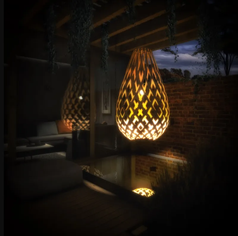 Teardrop-shaped pendant light with diamond lattice pattern hanging over a reflecting pool at dusk