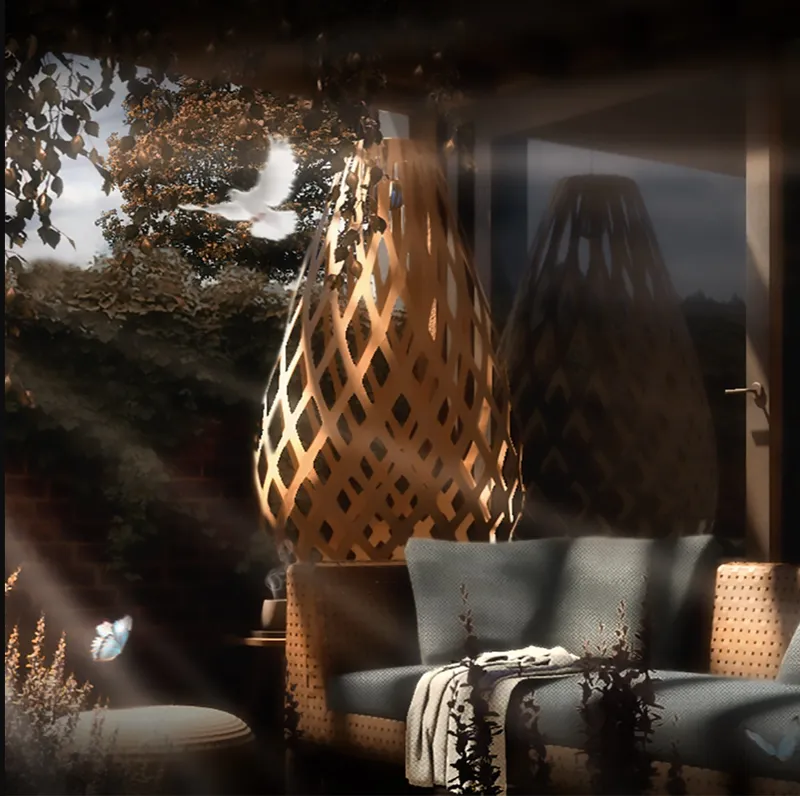 Latticed teardrop pendant lamp illuminated beside sofa with textured cushions and hanging plants