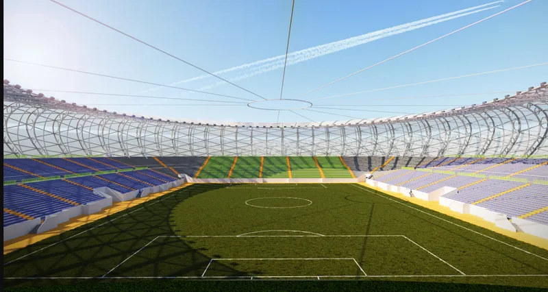 Interior view from pitch level showing tiered seating and the arched cable-supported roof under blue sky